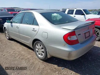 2003 Toyota Camry LE with VIN 4T1BE32K03U259171, listed as a IAAI auction lot 41912120 with 274,162 mi miles and . Bid and sale history available at DreamBid. Image 3.