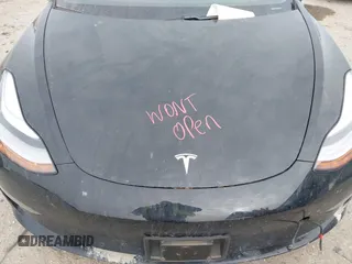 2018 Tesla Model 3 Long Range Battery with VIN 5YJ3E1EB9JF188437, listed as a IAAI auction lot 41371254 with 55,934 mi miles and . Bid and sale history available at DreamBid. Image 10.