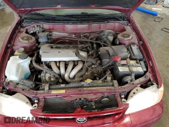 1999 Toyota Corolla VE z VIN 1NXBR12E4XZ286950, wystawiony jako Copart lot #58784525 z przebiegiem 195 720 mil mil oraz Nie do naprawy • Non repairable. Historia ofert i sprzedaży dostępna na DreamBid. Obrazek 11.