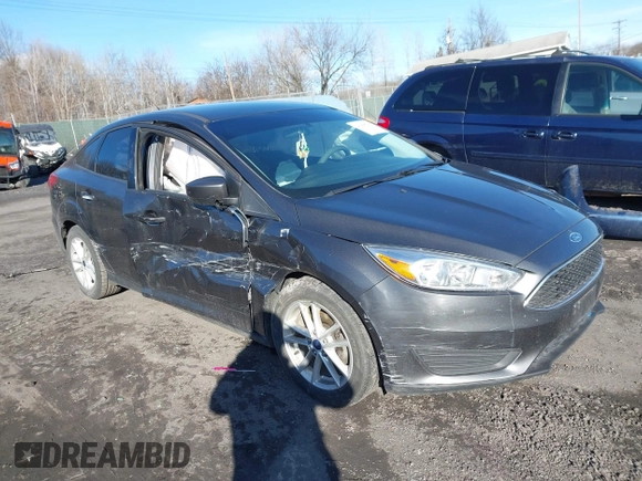 2018 Ford Focus SE z VIN 1FADP3F2XJL295508, wystawiony jako IAAI lot #41608216 z przebiegiem 89 696 mil mil oraz . Historia ofert i sprzedaży dostępna na DreamBid. Obrazek 1.