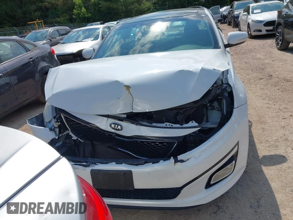 2015 Kia Optima EX with VIN 5XXGN4A77FG497218, listed as a IAAI auction lot 42464839 with 128,355 mi miles and . Bid and sale history available at DreamBid. Image 12.