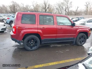2015 Jeep Patriot Altitude Edition with VIN 1C4NJPBA1FD342995, listed as a IAAI auction lot 41796470 with 130,303 mi miles. Bid and sale history available at carsss.com. Image 13.