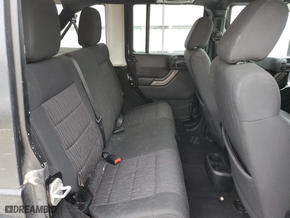 2012 Jeep Wrangler Unlimited Sport with VIN 1C4BJWDG1CL171567, listed as a Copart auction lot 87617405 with 135,802 mi miles and Salvage Title. Bid and sale history available at carsss.com. Image 10.