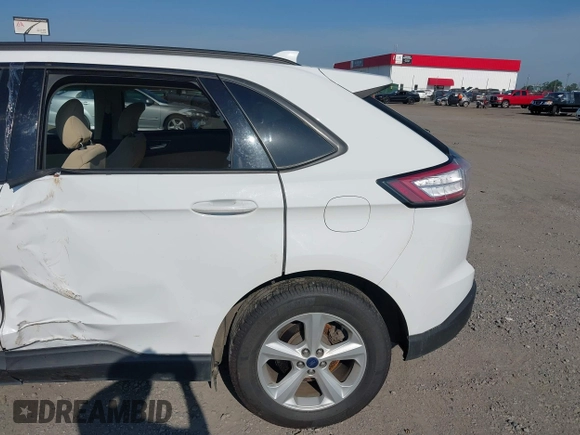 2015 Ford Edge SE z VIN 2FMTK3G92FBC22197, wystawiony jako IAAI lot #42578472 z przebiegiem 100 878 mil mil oraz . Historia ofert i sprzedaży dostępna na DreamBid. Obrazek 13.