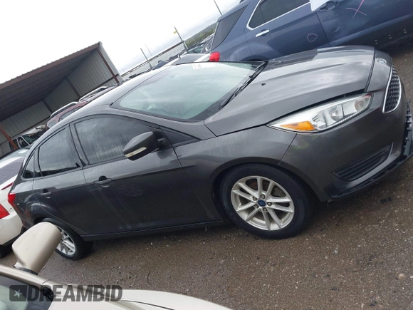 2015 Ford Focus SE with VIN 1FADP3F28FL219552, listed as a IAAI auction lot 41959648 with 128,590 mi miles. Bid and sale history available at carsss.com. Image 13.