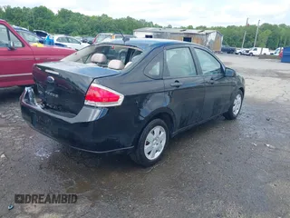 2009 Ford Focus S z VIN 1FAHP34N09W220485, wystawiony jako IAAI lot #42249397 z przebiegiem 68 869 mil mil oraz . Historia ofert i sprzedaży dostępna na DreamBid. Obrazek 4.
