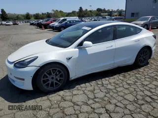 2019 Tesla Model 3 Mid Range with VIN 5YJ3E1EA3KF425125, listed as a Copart auction lot 56072995 with 105,345 mi miles and Salvage Title. Bid and sale history available at DreamBid. Image 1.