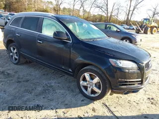 2015 Audi Q7 3.0L TDI Premium with VIN WA1CMAFE6FD019951, listed as a IAAI auction lot 41590509 with 125,000 mi miles. Bid and sale history available at carsss.com. Image 1.
