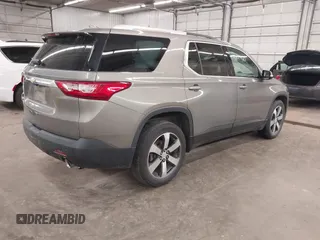 2018 Chevrolet Traverse LT z VIN 1GNEVHKW0JJ166321, wystawiony jako IAAI lot #42014168 z przebiegiem 81 442 mil mil oraz . Historia ofert i sprzedaży dostępna na DreamBid. Obrazek 4.