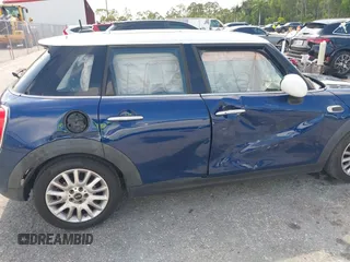 2015 MINI Hardtop 4 Door with VIN WMWXS5C51FT827510, listed as a IAAI auction lot 42365599 with 53,667 mi miles and . Bid and sale history available at DreamBid. Image 6.