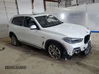 2022 BMW X5 xDrive45e with VIN 5UXTA6C0XN9L97579, listed as a Copart auction lot 52603265 with Not Provided miles and Salvage Title. Bid and sale history available at DreamBid. Image 4.