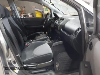 2007 Honda Fit Sport with VIN JHMGD37637S052380, listed as a IAAI auction lot 41219293 with 171,586 mi miles. Bid and sale history available at carsss.com. Image 5.