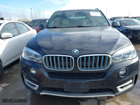 2018 BMW X5 xDrive40e iPerformance with VIN 5UXKT0C52J0W02406, listed as a IAAI auction lot 41449943 with 74,215 mi miles. Bid and sale history available at carsss.com. Image 13.