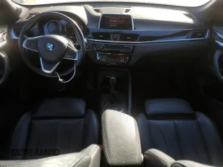 2018 BMW X1 xDrive28i with VIN WBXHT3C39J5L29286, listed as a Copart auction lot 82979384 with 108,250 mi miles and Salvage Title. Bid and sale history available at carsss.com. Image 8.