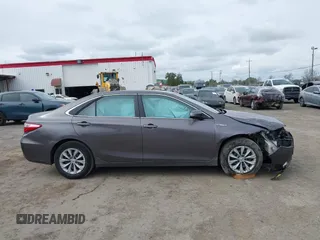2017 Toyota Camry Hybrid LE with VIN 4T1BD1FK9HU216117, listed as a IAAI auction lot 41710989 with 99,595 mi miles. Bid and sale history available at carsss.com. Image 13.
