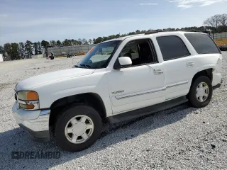 2005 GMC Yukon SLT with VIN 1GKEC13T25R136033, listed as a Copart auction lot 48189995 with 0 mi miles and Salvage Title. Bid and sale history available at carsss.com. Image 1.