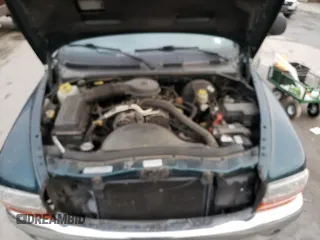 1997 Dodge Dakota z VIN 1B7GG23XXVS260724, wystawiony jako Copart lot #81040004 z przebiegiem Nie podano mil oraz Szkoda całkowita • Salvage title. Historia ofert i sprzedaży dostępna na DreamBid. Obrazek 11.