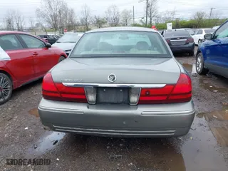 2003 Mercury Grand Marquis LS Premium with VIN 2MEFM75W33X655360, listed as a IAAI auction lot 41922734 with 86,059 mi miles. Bid and sale history available at carsss.com. Image 17.