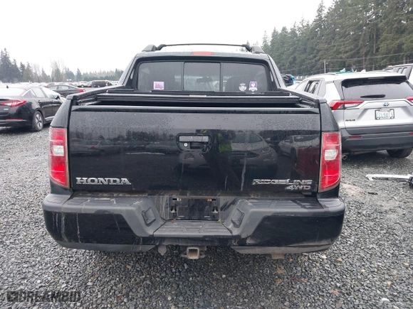 2011 Honda Ridgeline RTS with VIN 5FPYK1F44BB004240, listed as a IAAI auction lot 41248168 with 133,327 mi miles. Bid and sale history available at carsss.com. Image 16.