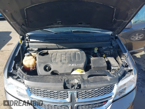 2015 Dodge Journey SXT with VIN 3C4PDCBG9FT696593, listed as a IAAI auction lot 41600713 with 139,763 mi miles. Bid and sale history available at carsss.com. Image 10.