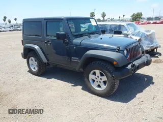 2017 Jeep Wrangler Sport z VIN 1C4AJWAG2HL756021, wystawiony jako IAAI lot #42324355 z przebiegiem 68 245 mil mil oraz . Historia ofert i sprzedaży dostępna na DreamBid. Obrazek 1.