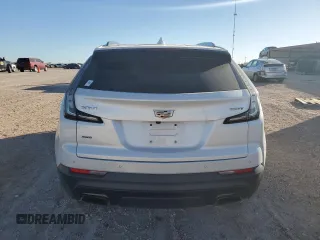 2020 Cadillac XT4 AWD Sport z VIN 1GYFZFR49LF094478, wystawiony jako Copart lot #79454264 z przebiegiem 91 405 mil mil oraz Szkoda całkowita • Salvage title. Historia ofert i sprzedaży dostępna na DreamBid. Obrazek 6.