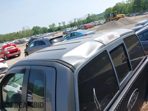 2005 Ford F-150 XL with VIN 1FTRF14W95NA43854, listed as a IAAI auction lot 42403913 with 145,151 mi miles and . Bid and sale history available at DreamBid. Image 16.