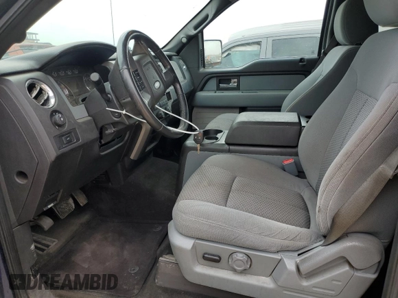 2012 Ford F-150 XL z VIN 1FTFW1CT3CKE20459, wystawiony jako Copart lot #55411515 z przebiegiem 144 041 mil mil oraz Szkody całkowita. Historia ofert i sprzedaży dostępna na DreamBid. Obrazek 7.