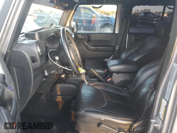 2017 Jeep Wrangler Unlimited Sahara with VIN 1C4HJWEG8HL697341, listed as a Copart auction lot 81313424 with 118,693 mi miles and Salvage title. Bid and sale history available at DreamBid. Image 7.