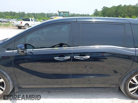 2018 Honda Odyssey Elite z VIN 5FNRL6H91JB109378, wystawiony jako IAAI lot #42270766 z przebiegiem 156 873 mil mil oraz . Historia ofert i sprzedaży dostępna na DreamBid. Obrazek 14.