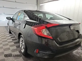 2017 Honda Civic LX with VIN 2HGFC2F58HH575889, listed as a IAAI auction lot 42285632 with 63,687 mi miles and . Bid and sale history available at DreamBid. Image 48.