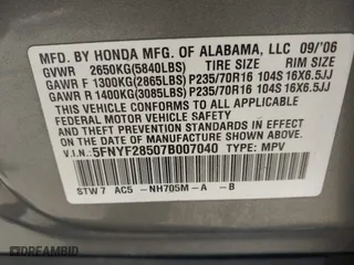 2007 Honda Pilot EX-L with VIN 5FNYF28507B007040, listed as a IAAI auction lot 42038302 with 251,262 mi miles. Bid and sale history available at carsss.com. Image 9.