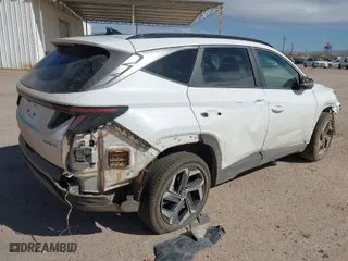 2022 Hyundai Tucson Hybrid SEL Convenience with VIN KM8JFCA1XNU034258, listed as a IAAI auction lot 41577068 with 67,219 mi miles. Bid and sale history available at carsss.com. Image 4.
