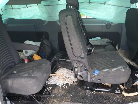 2015 Ford Transit XL z VIN 1FBZX2ZM5FKA73192, wystawiony jako Copart lot #54379885 z przebiegiem Nie podano mil oraz Szkody całkowita. Historia ofert i sprzedaży dostępna na DreamBid. Obrazek 11.