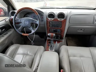 2007 GMC Envoy Denali with VIN 1GKET63M472231291, listed as a Copart auction lot 77020984 with 157,364 mi miles and Salvage Title. Bid and sale history available at DreamBid. Image 8.