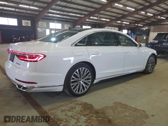 2019 Audi A8 L with VIN WAU8DAF86KN005765, listed as a Copart auction lot 49065575 with 32,600 mi miles and Salvage Title. Bid and sale history available at carsss.com. Image 3.