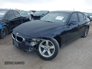 2015 BMW 3 Series 320i with VIN WBA3B1C53FK138310, listed as a IAAI auction lot 41677208 with 57,891 mi miles. Bid and sale history available at carsss.com. Image 2.