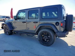 2021 Jeep Wrangler Unlimited Sport S with VIN 1C4HJXDG4MW699376, listed as a Copart auction lot 47202615 with 57,192 mi miles and Salvage Title. Bid and sale history available at DreamBid. Image 2.