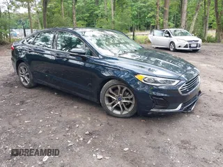 2020 Ford Fusion SEL with VIN 3FA6P0CD1LR180409, listed as a IAAI auction lot 42384311 with 39,163 mi miles and . Bid and sale history available at DreamBid. Image 1.