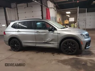 2020 Volkswagen Tiguan SE with VIN 3VV2B7AX5LM149305, listed as a IAAI auction lot 41920685 with 30,512 mi miles and . Bid and sale history available at DreamBid. Image 13.