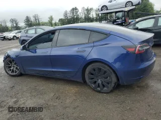 2021 Tesla Model 3 Long Range z VIN 5YJ3E1EB6MF974491, wystawiony jako Copart lot #55062505 z przebiegiem Nie podano mil oraz Szkoda całkowita • Salvage title. Historia ofert i sprzedaży dostępna na DreamBid. Obrazek 2.