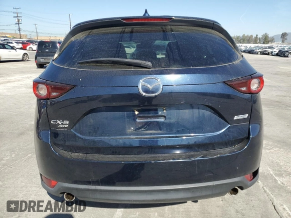 2019 Mazda CX-5 Touring with VIN JM3KFBCM0K0697813, listed as a Copart auction lot 52239505 with 49,844 mi miles and Salvage Title. Bid and sale history available at carsss.com. Image 6.