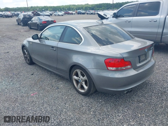 2011 BMW 1 Series 128i with VIN WBAUP9C57BVL90171, listed as a IAAI auction lot 42801051 with 150,148 mi miles and . Bid and sale history available at DreamBid. Image 3.