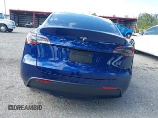 2025 Tesla Model Y Long Range z VIN 7SAYGDED0SF256650, wystawiony jako IAAI lot #41993206 z przebiegiem Nie podano mil oraz . Historia ofert i sprzedaży dostępna na DreamBid. Obrazek 16.