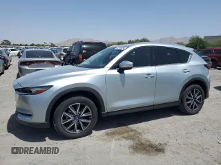 2018 Mazda CX-5 Grand Touring with VIN JM3KFBDM0J0377243, listed as a Copart auction lot 62199295 with 37,930 mi miles and Salvage title. Bid and sale history available at DreamBid. Image 1.