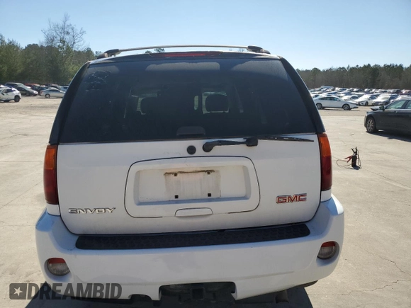 2006 GMC Envoy Denali with VIN 1GKET63M762190296, listed as a Copart auction lot 46691595 with 128,985 mi miles and Salvage Title. Bid and sale history available at carsss.com. Image 6.