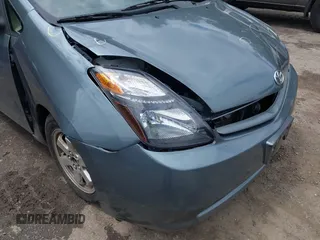 2005 Toyota Prius z VIN JTDKB20U853125464, wystawiony jako IAAI lot #42324259 z przebiegiem 166 742 mil mil oraz . Historia ofert i sprzedaży dostępna na DreamBid. Obrazek 12.
