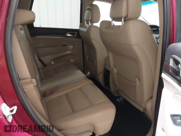 2014 Jeep Grand Cherokee Limited with VIN 1C4RJFBT1EC139798, listed as a IAAI auction lot 41772069 with 122,282 mi miles and . Bid and sale history available at DreamBid. Image 8.