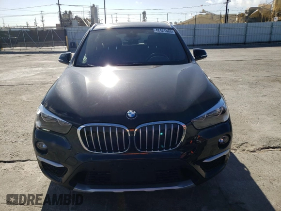 2019 BMW X1 sDrive28i with VIN WBXHU7C52K3H45282, listed as a Copart auction lot 42421563 with 8,057 mi miles. Bid and sale history available at carsss.com. Image 5.