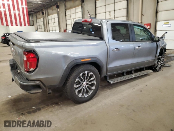 2023 GMC Canyon 4WD Denali with VIN 1GTP6FEK6P1232066, listed as a Copart auction lot 85235884 with 20,165 mi miles and Salvage Title. Bid and sale history available at carsss.com. Image 3.